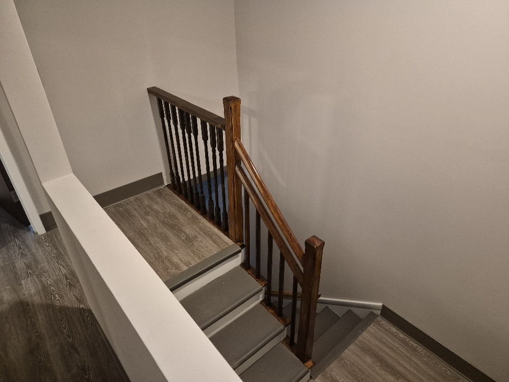 A view of the stairway from the hall.