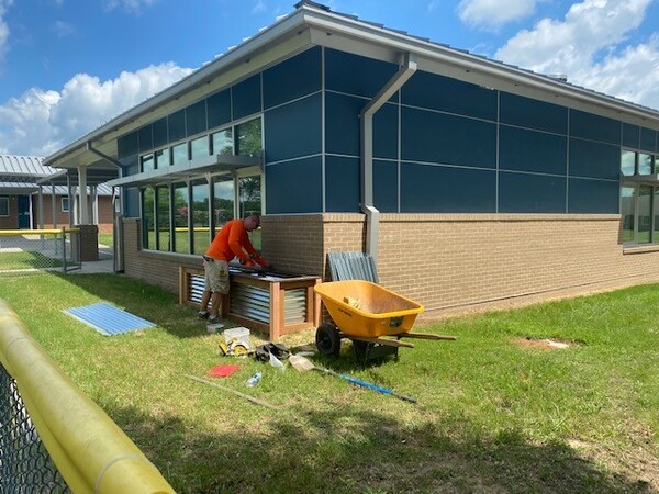 Construction of an outdoor play and exploration area for children .